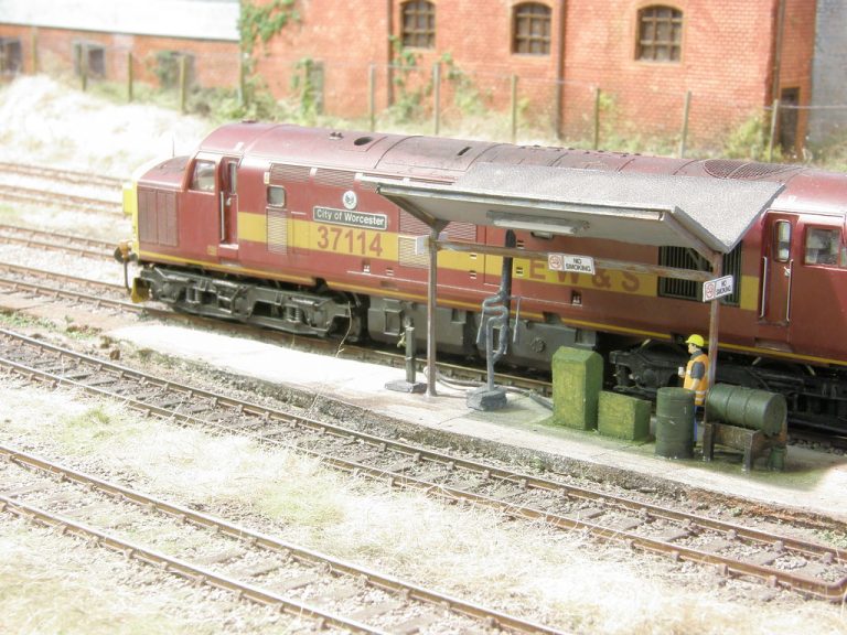 EWS Class 37 by the fuel point at Cramdin Yard