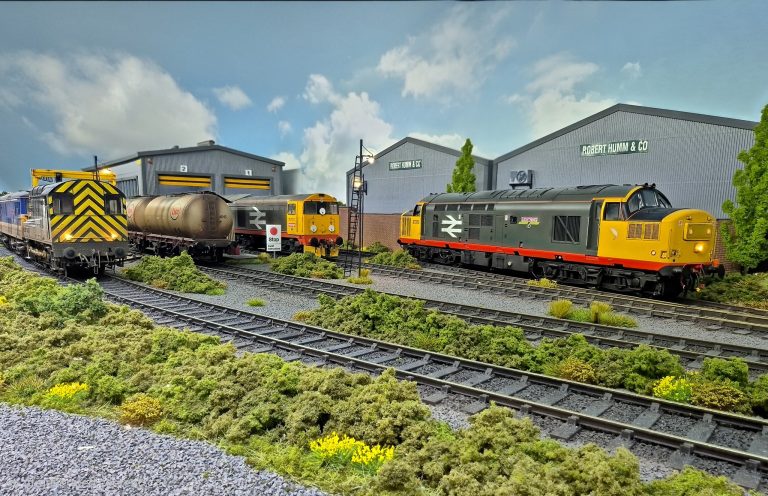 Railfreight Class 37, tank wagons and a shunter on the depot roads at Lockton Lane
