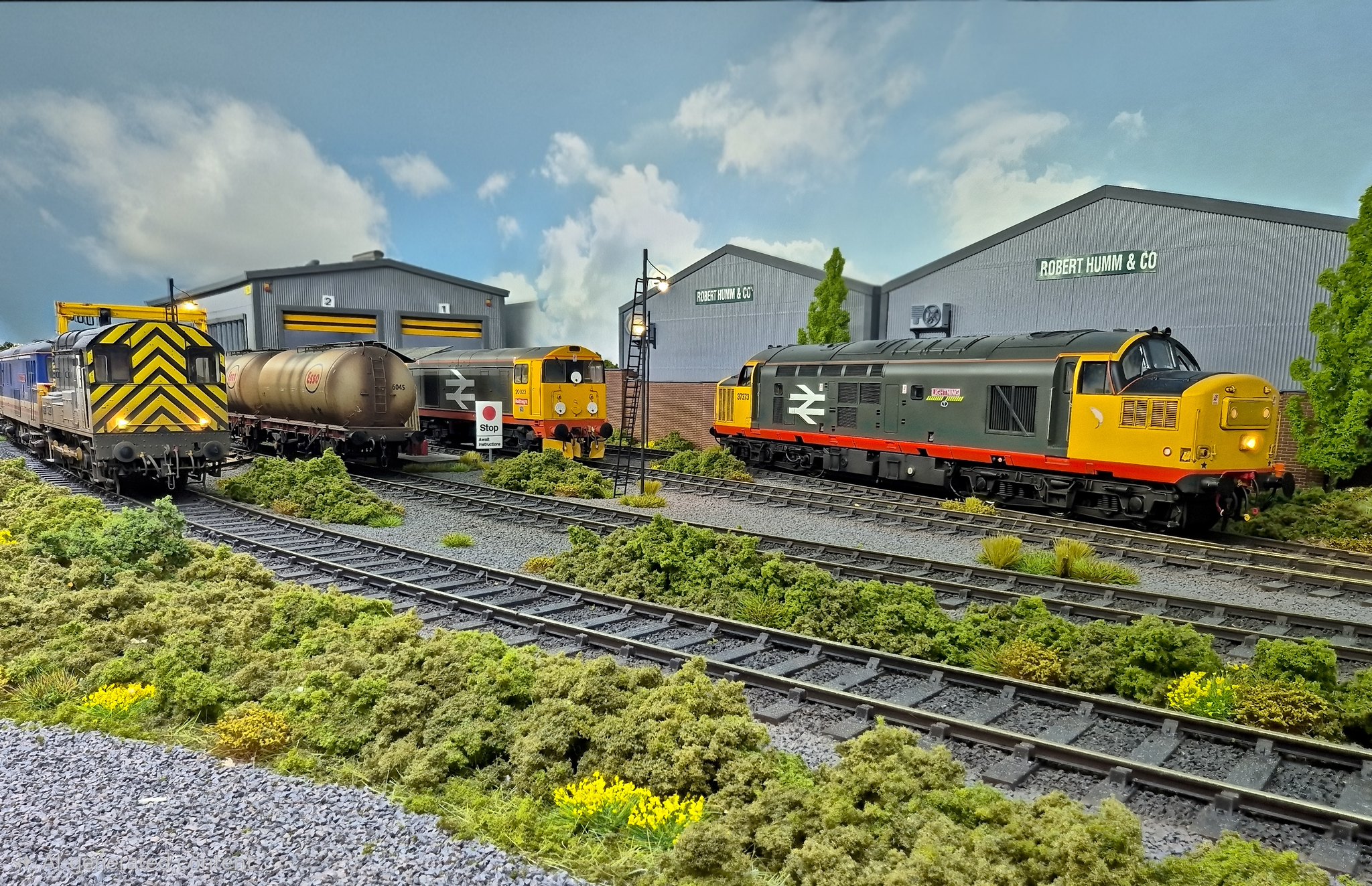 Railfreight Class 37, tank wagons and a shunter on the depot roads at Lockton Lane