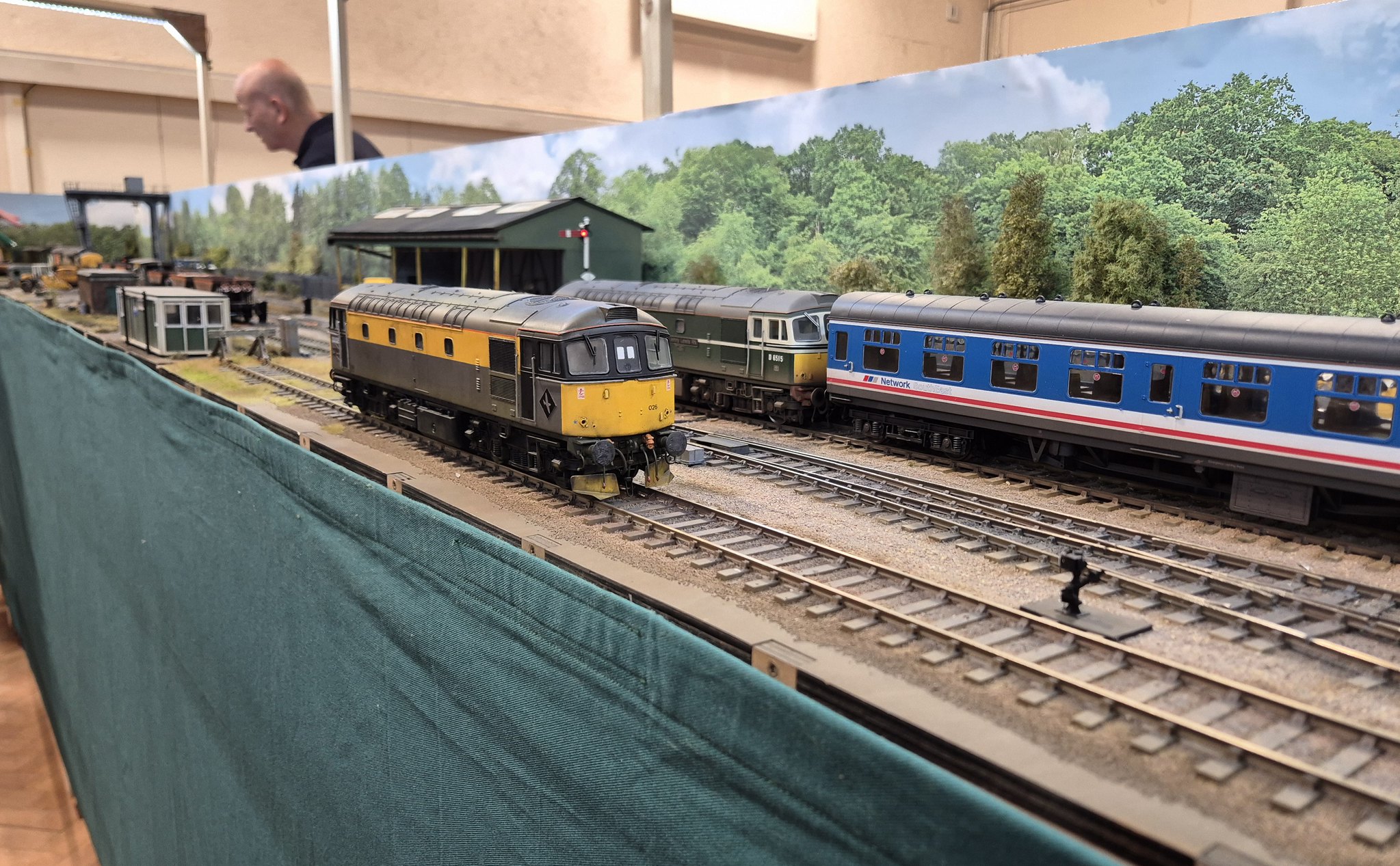 Class 33 and Network SouthEast coaches on the main line at Patrick Lane