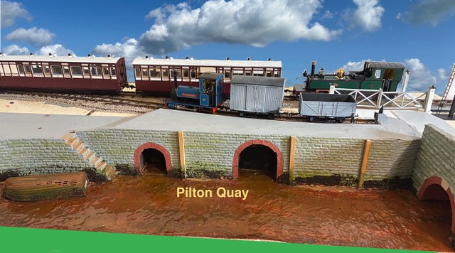 Narrow gauge train on the quay wall at Pilton Quay