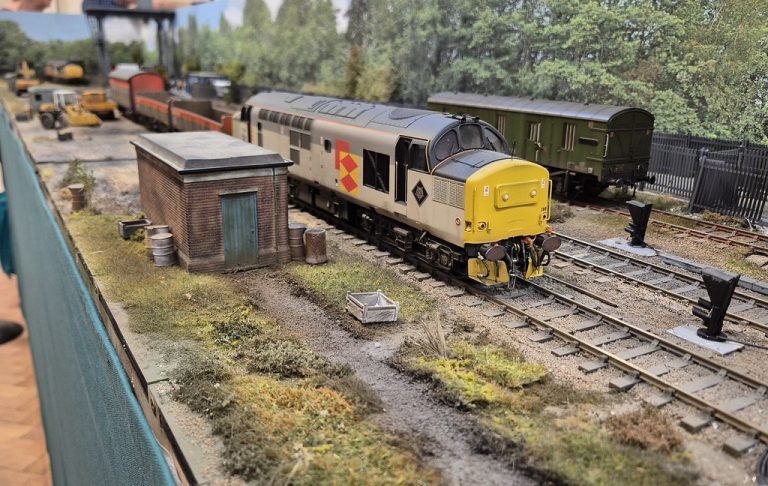 Class 37 in Railfreight grey beside the fuel depot at Patrick Lane