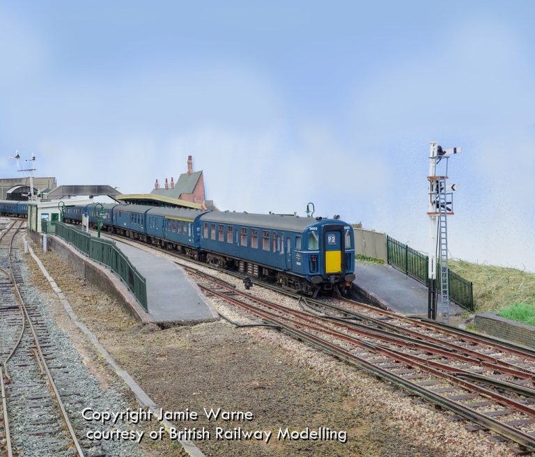Blue Southern Region unit at the Redbridge station platform beside the signal